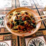Kelezatan satu porsi Bakmie Anglo Pak Trisno yang kaya aroma asap hasil olahan arang tradisional. (Sumber: Google Review/Adnan Supardi)
