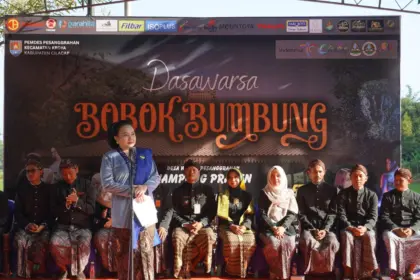 Bobok Bumbung atau menabung uang pajak di dalam ruas bambu kembali digelar dengan meriah di Desa Pesanggrahan, Sabtu (18/4/2026).(dok Kominfo Cilacap)